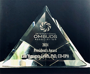 Crystal Pyramid with IOA logo and 2024 President's Award >Lisa Yamagata-Lynch